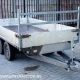 Een gebruikte plateauwagen met aluminium borden